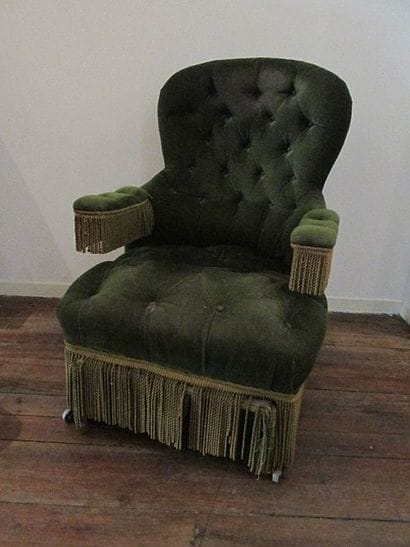 Fauteuil à mécanisme, les accotoirs à

manchettes...