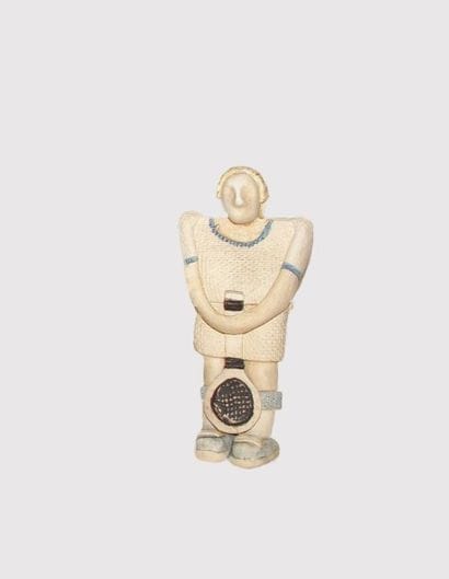 Joueur de tennis. 

Figurine d'art populaire...