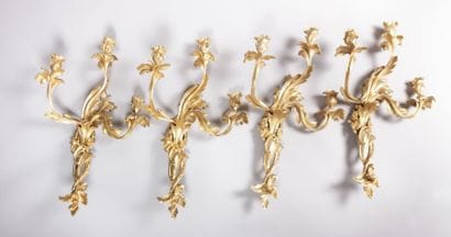 Suite de quatre appliques en bronze doré,...
