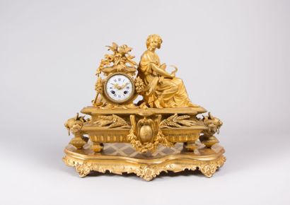 Pendule en régule doré, le cadran émaillé

à...