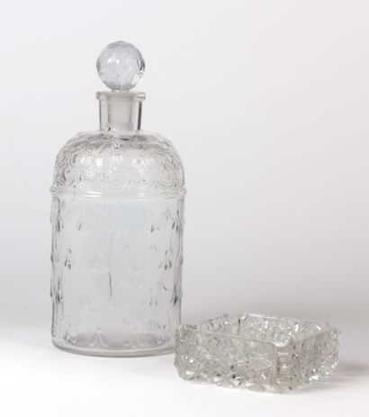 GUERLAIN

Flacon en verre soufflé et moulé...