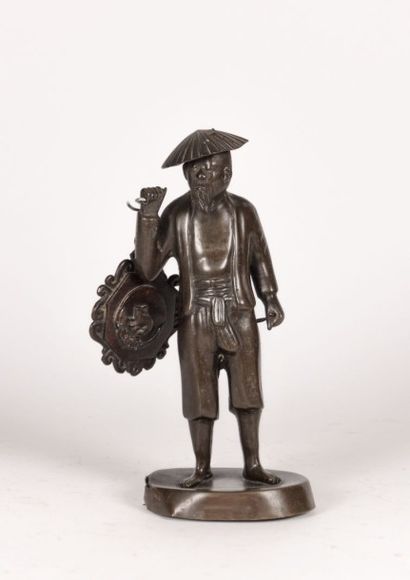 Sujet en bronze figurant un chinois chapeauté...