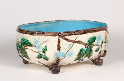 Jardinière en faïence à décor polychrome...
