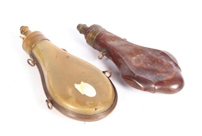 Poire à poudre en corne

(Assez bon état)

On...