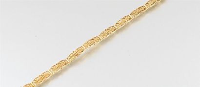 Bracelet en or à mailles filigranées, le...