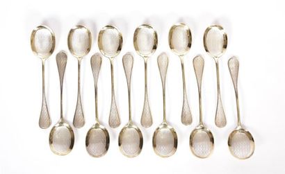 Douze cuillères à glace en argent et argent...
