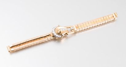 Montre tour de bras de dame en or rose 750...