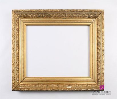 Cadre en bois et stuc mouluré et doré dit...