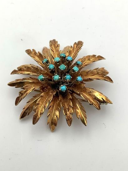 Broche figurant une fleur en or jaune 750...