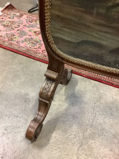 Large molded and carved walnut fire screen...