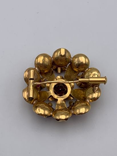 Broche circulaire en or jaune 750 millièmes...