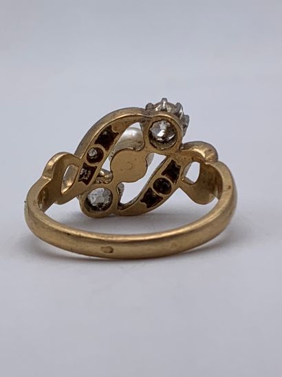 Bague trilogie en or 750 millièmes ornée...