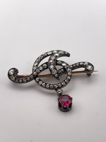 Délicate broche en or 750 millièmes et argent...