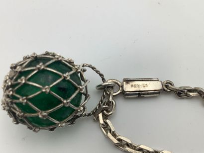 Hermès. Porte clé en argent figurant un flotteur...