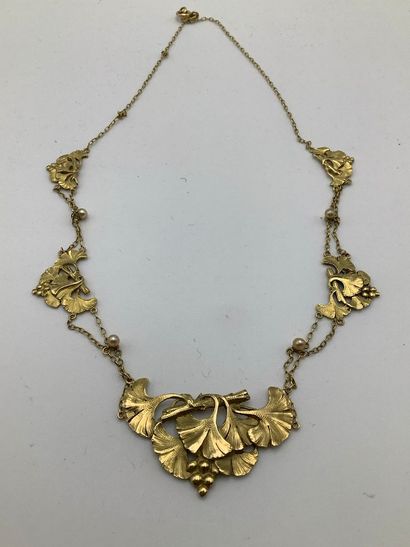 Collier en or jaune 750 millièmes figurant...