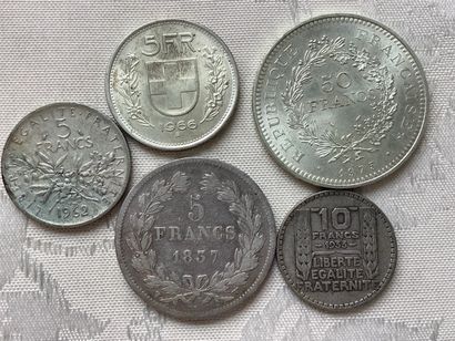 350 grams of various silver coins.