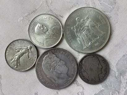 350 grams of various silver coins.