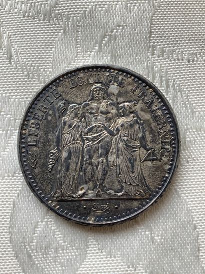 10 franc Hercules coin.