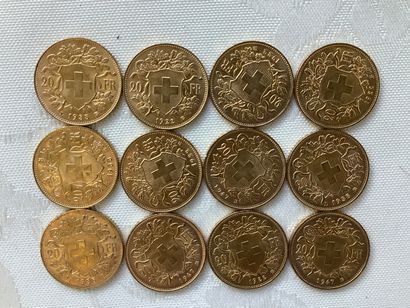 12 pièces 20 francs or, années 1922, 1935,...