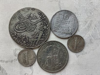56 grams of various silver coins.