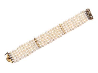 Bracelet articulé composé de 5 rangs de perles...