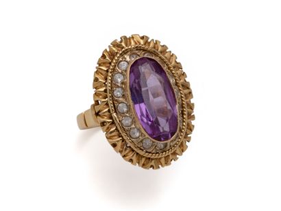 Bague marquise en or 750 millièmes ornée...