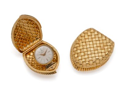 MOVADO
Montre de sac en or 750 millièmes,...