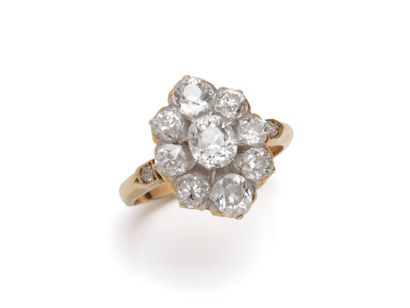 Bague marguerite en or 750 millièmes, habillée...