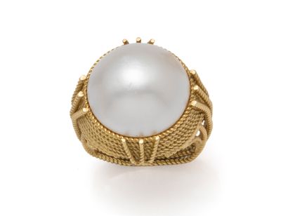 Bague dôme en fils d'or 750 millièmes torsadés,...