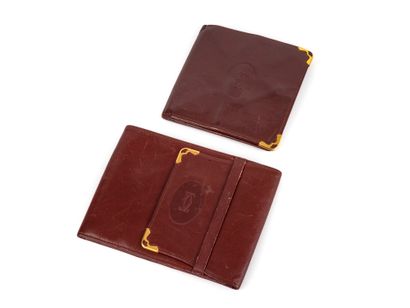 MUST DE CARTIER
Bordeaux leather set including...