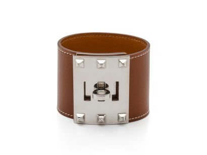 HERMES ''Kelly Dog''
Bracelet manchette en...