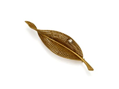 Broche en or 750 millièmes, stylisant une...