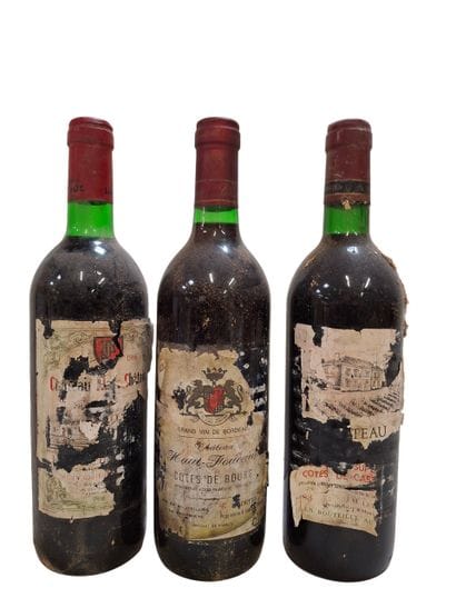 Lot comprenant:
1 Château Haut Châtain 1986...