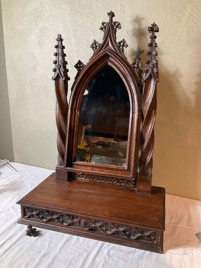A neo-Gothic style oak psyche. One drawer....