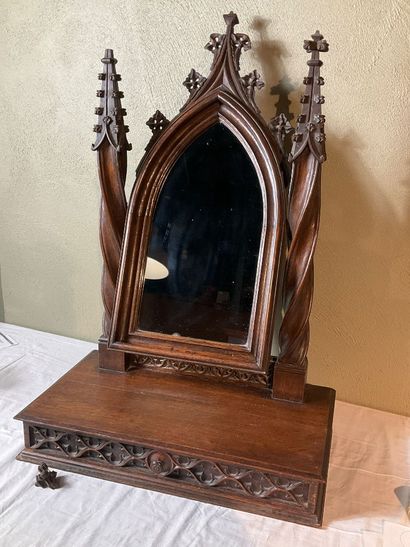 A neo-Gothic style oak psyche. One drawer....