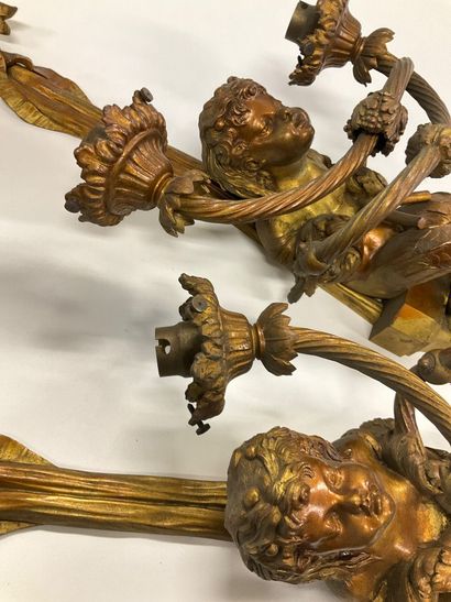 Pair of bronze sconces decorated with a mermaid...