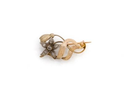 Petite broche en or 585 et argent 800 millièmes,...