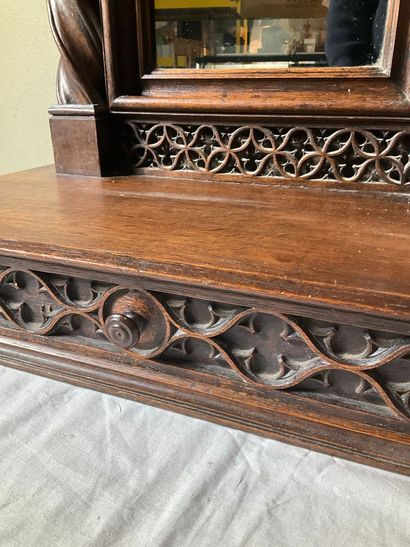 A neo-Gothic style oak psyche. One drawer....