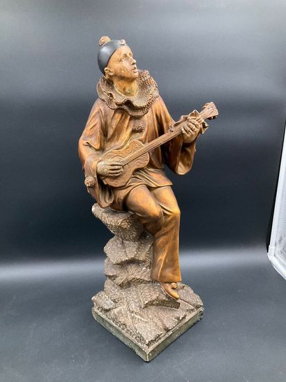 Statuette of Pierrot playing the guitar....