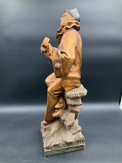 Statuette of Pierrot playing the guitar....