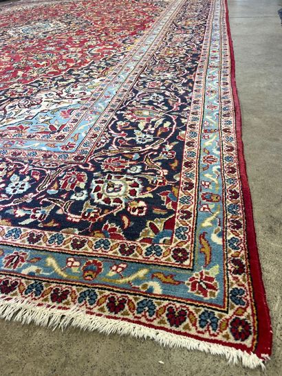 An Oriental rug, size approx. 4.30 m x 3...
