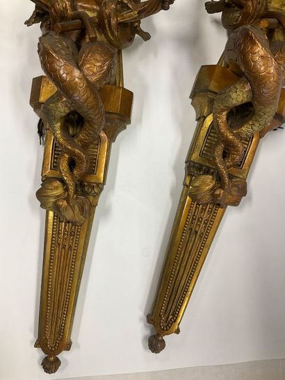 Pair of bronze sconces decorated with a mermaid...