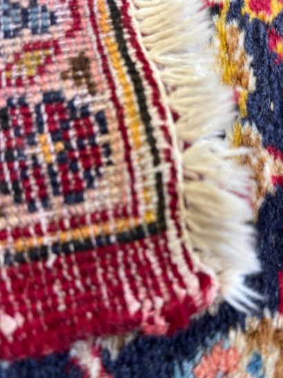 An Oriental rug, size approx. 4.30 m x 3...