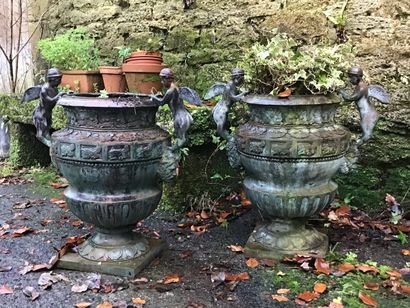 Pair of cast bronze vases decorated with...