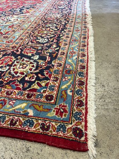 An Oriental rug, size approx. 4.30 m x 3...