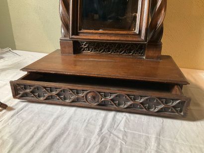 A neo-Gothic style oak psyche. One drawer....
