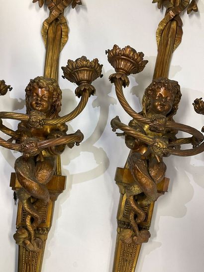Pair of bronze sconces decorated with a mermaid...