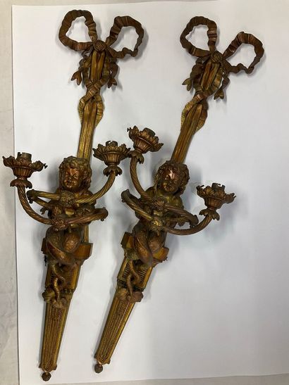 Pair of bronze sconces decorated with a mermaid...