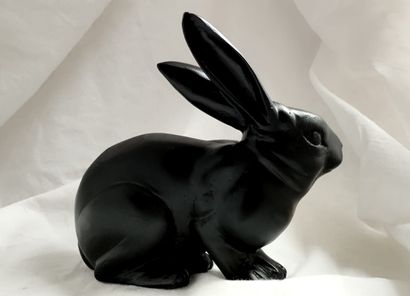 Deep black partine animal bronze featuring...
