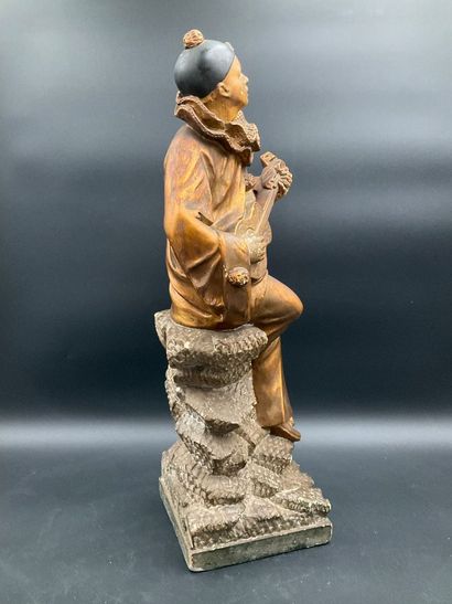 Statuette of Pierrot playing the guitar....